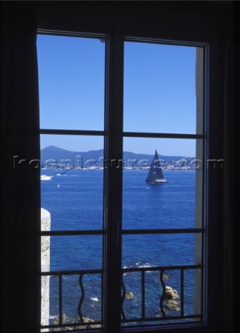View through window of yacht sailing in harbour 
