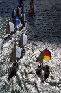 fleet of yachts racing downwind
