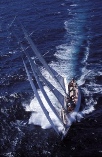 Classic schooner sailing up wind in rough seas