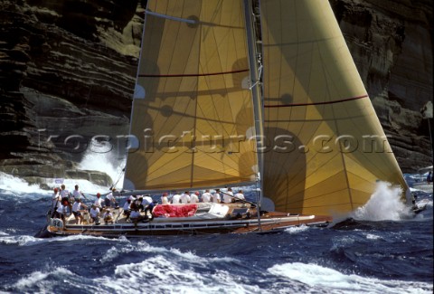 Swan racing close inshore during Antigua Sailing Week