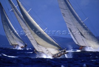Classic yachts crashing through rough seas during Antigua Race Week 1994