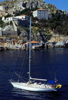 Cruising yacht entering a port in Greece