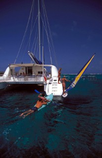 watersports on the stern of a charter catamaran in the Seychelles