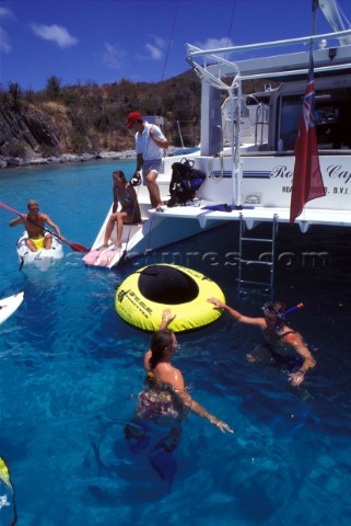 Charter guests enjoy a vacation on the Royal Cape catamaran Caribbean