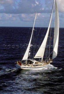 Cruising yacht under full sail
