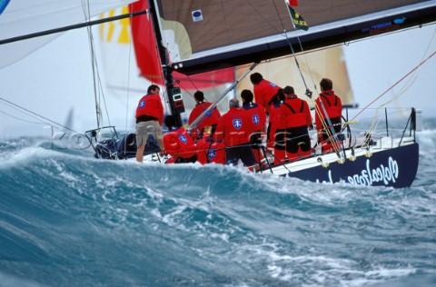 Mascalzone Latino competing at the Commodores Cup in rough seas and strong wind
