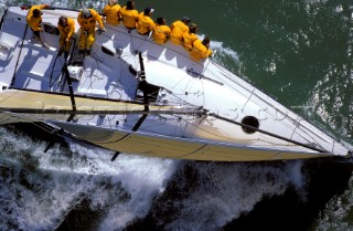 Aerial view of crew on board Farr 40 Dignity hiking out on windward rail