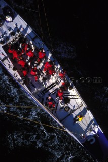Crew on board an International Americas Cup Class racing yacht
