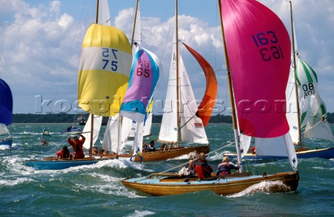 Fleet of X Boats racing down wind during Cowes Week Isle of Wight
