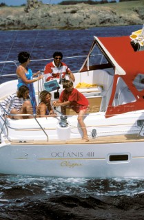 Family on board a Beneteau Oceanis 411 charter yacht in the Mediterranean