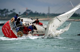 Sail yacht Ocean Crawler broaches in stong winds causing her to veer out of control and crew to hang on tight