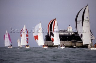 Yachts racing downwind passed No Mans Land fort in the English Channel