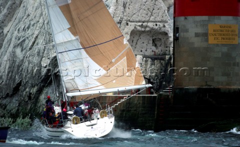 Sailing yacht Spirit of the North is towed to safety after running aground during the Round the Isla
