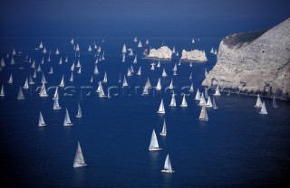Aerial view of fleet of yachts competing in the Round the Island Race in the Solent, UK