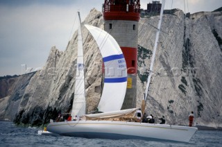 Two sailing yachts run aground on Goose Rock by the Needles lighthouse, Isle of Wight, UK