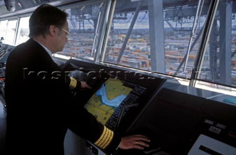The Captain on the bridge of a ship