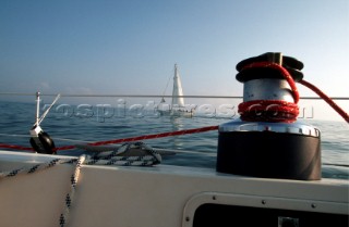 Detail of ropes and winch on board sailing yacht