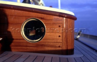 Detail of deckhouse and porthole on classic W Class yacht