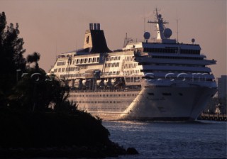 Cruise liner Norwegian Wind leaving port at sunset