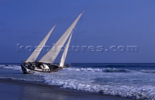 Sailing yacht Priority beached at low tide in California