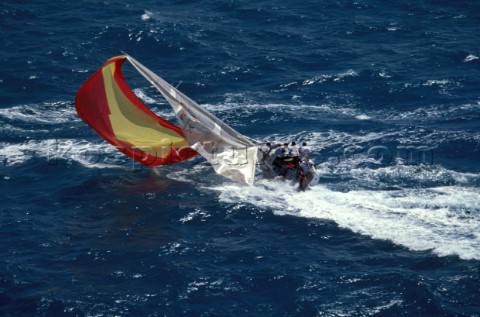 Aerial of severe broach on a J80 sportsboat in Puerto Rico