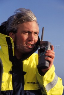 Man using hand-held VHF radio