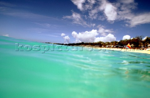 Clear shallow water off tropical beach St Maarten Caribbean