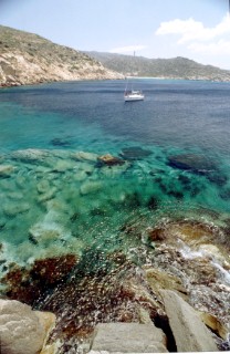 Yacht at anchor in sahllow water, Mediterranean