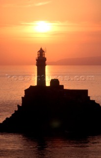 Sunset over the Fastnet lighthouse in the Irish Sea