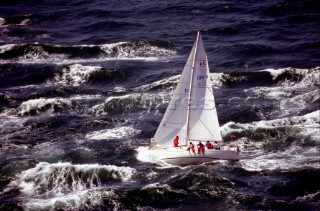 Aerial view of sailing yacht in rough seas