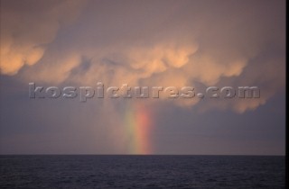 Rainbow on cloudy horizon