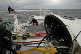 Crew repair daggerboard after collision
