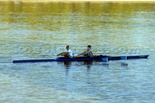 Two rowers training in a double skull on the river Thames