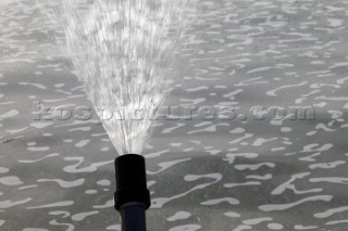 Deatil of fountain spout in pool