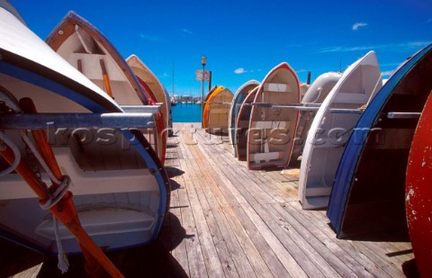 Dinghies stacked on dock  Auckland New Zealand