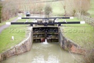 Lock gates on Kennet and Avon Canal.  Canal boats on English Kennet and Avon Canals.