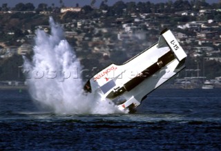 An unlimited hydroplane flips while comming down the main streight on Mission Bay in San Diego, California, USA