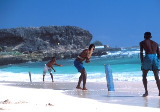 A local game of cricket in the Caribbean
