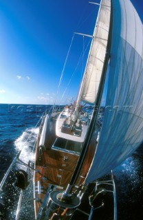 On the bow of a cruising yacht