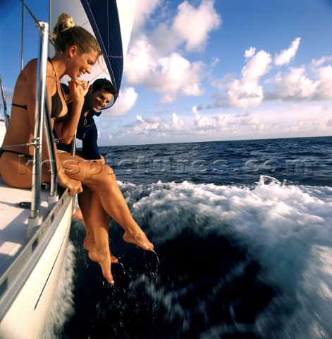 Romantic couple on cruising yacht