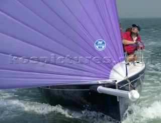 Skipper and crew onboard a J80