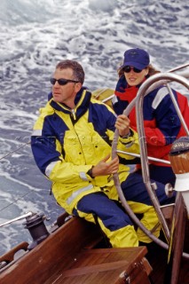 Couple on board sailing yacht