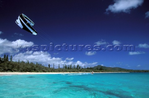 Kite surfers cruising in paradise