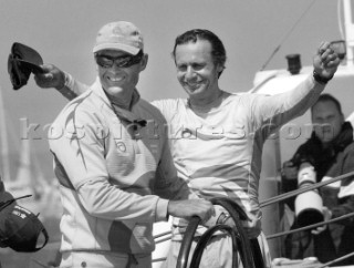 Ernesto Bertarelli, navigator and syndicate head of Switzerlands Alinghi, right, celebrates with skipper Russel Coutts, left, in Auckland, New Zealand, Tuesday, Feb. 18, 2003 after their boat won the 3rd race for the Americas Cup race against Team New Zealand. Alinghi is leading 3-0 in the best of nine competition.
