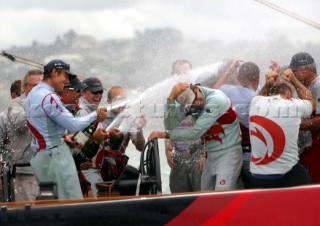 Alinghi celebrates their historic victory by winning the Americs Cup 2003