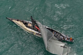 Team New Zealands NZL-82 stops dead in the water after breaking their mast during race four the Americas Cup in Auckland, New Zealand. Feb, 28. 2003. Team New Zealand suffered their second breakage of the event to trail Switzerlands Alinghi Challenge 4-0 in the best of nine races.