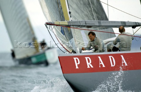 Italys Prada Challenge bowman Paolo Bassani second from the right perpares to set the spinnaker as t