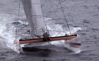 Maxi Cat Cheyenne owned by American Steve Fossett crosses the Finish after a record round the world non-stop voyage of 58 days, 9 hours, 32 minutes and 45 seconds.