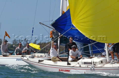 New Zealanders Cameron Dunn centre and Russell Coutts of Team Alinghi both hold up a flag in protest