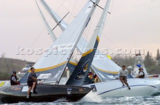 New Zealands Chris Dickson of Team ORACLE BMW Racing cross tacks  with Australias Peter Gilmour of Pizza-La Sailing Team during the finals to win the Investors Guaranty presentation of the King Edward VII Gold Cup 2003, Royal Bermuda Yacht Club, Hamilton, Bermuda. Oct, 26th. 2003   .